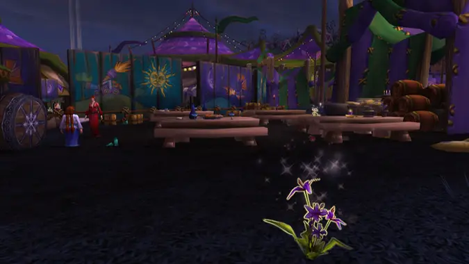 A sparkling flower in front of purple Darkmoon Faire tents