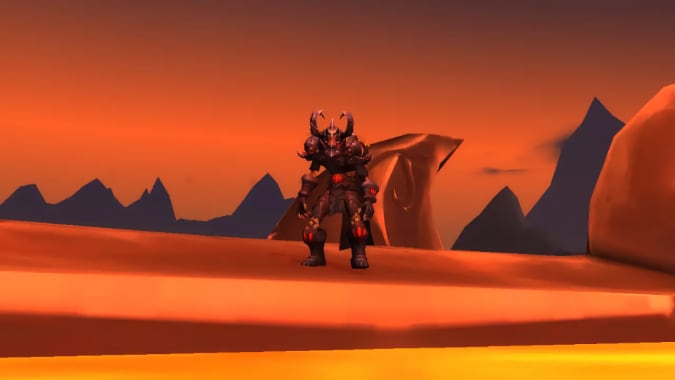 An undead NPC stands beside a pool of golden lava.