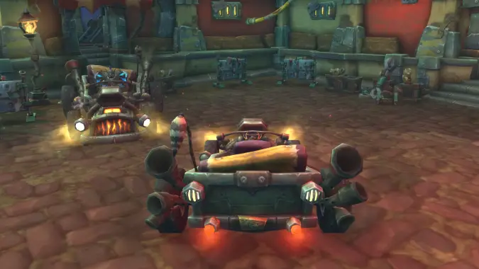 A pair of goblin-style cars parked in a corner.